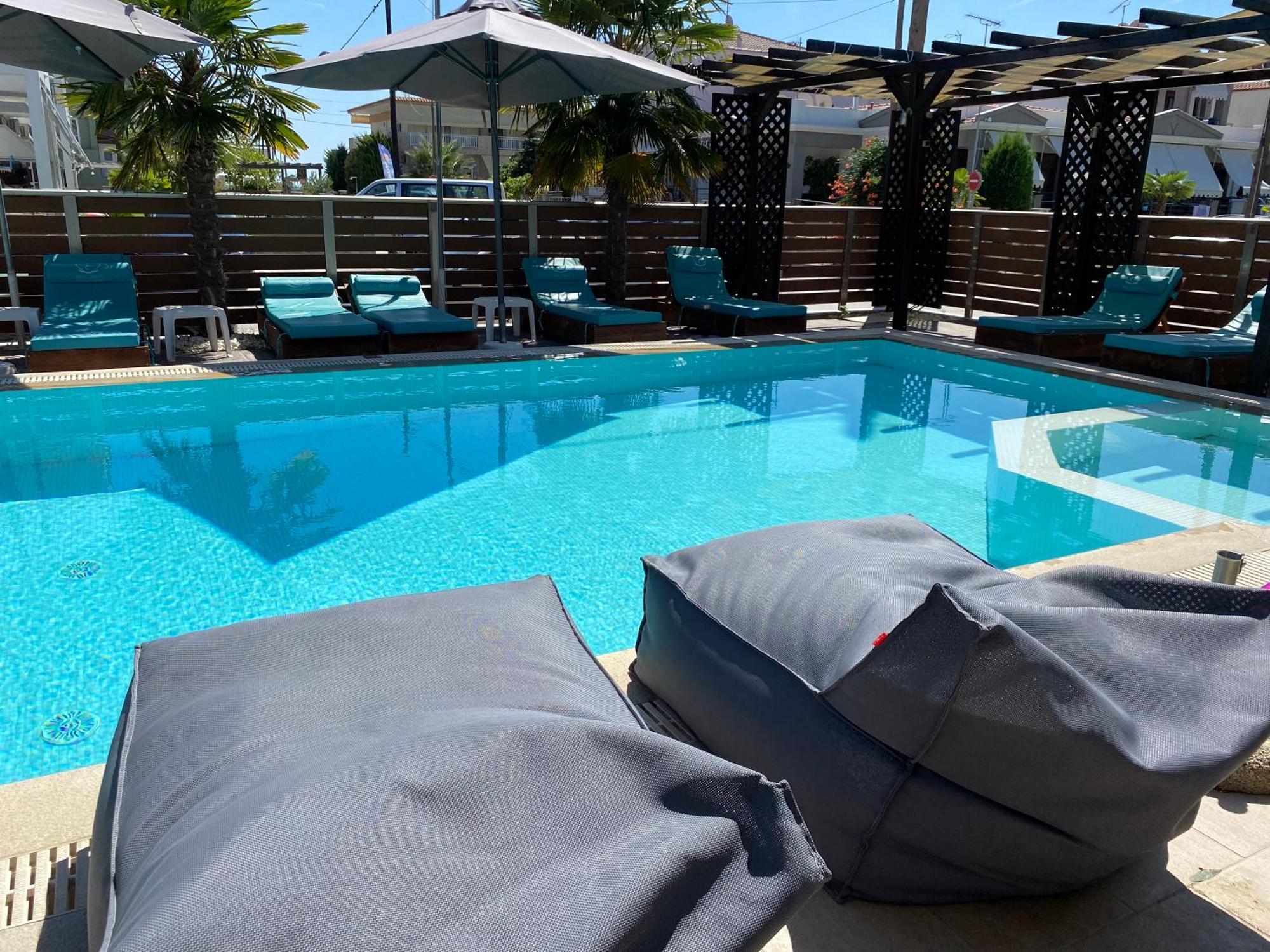 Sea Pearl Luxury Apartments Nea Vrasna Bagian luar foto
