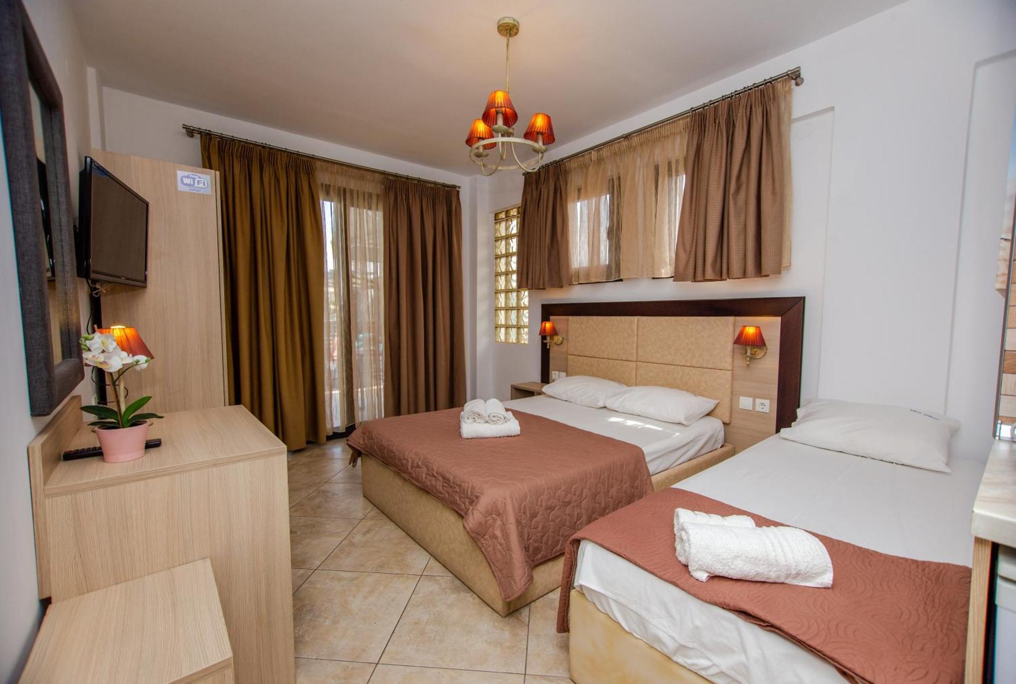 Sea Pearl Luxury Apartments Nea Vrasna Bagian luar foto