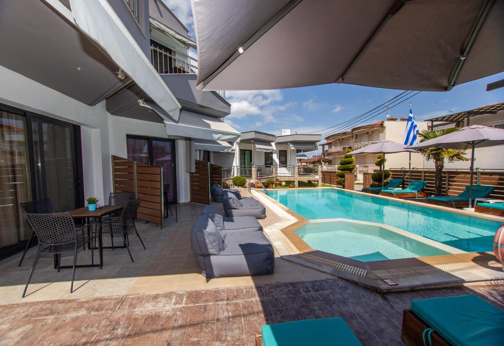 Sea Pearl Luxury Apartments Nea Vrasna Bagian luar foto