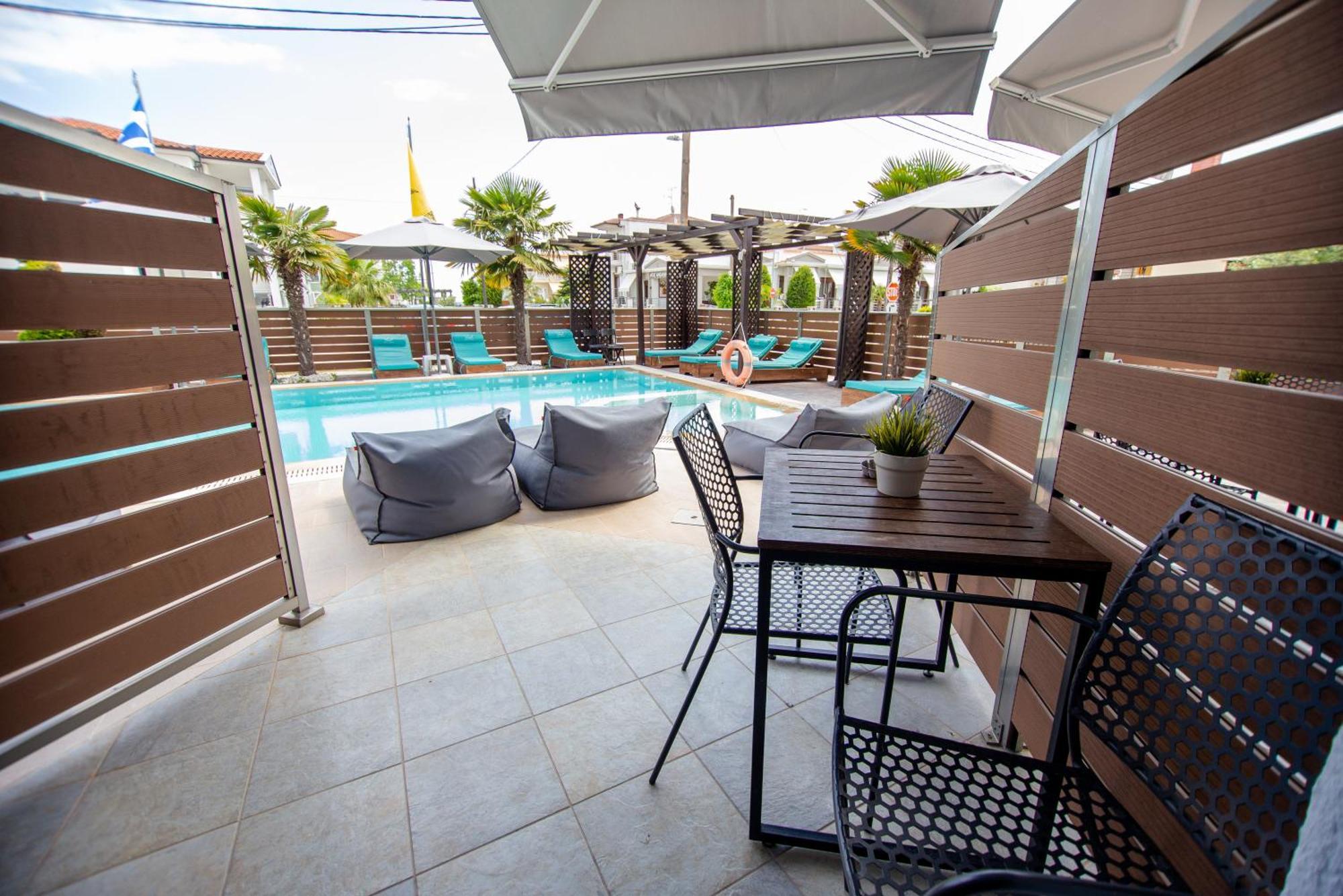 Sea Pearl Luxury Apartments Nea Vrasna Bagian luar foto
