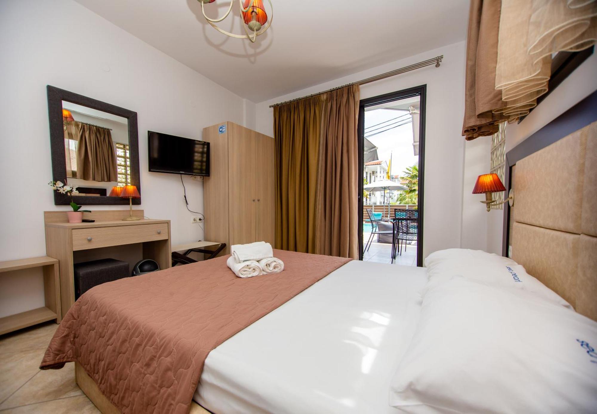 Sea Pearl Luxury Apartments Nea Vrasna Bagian luar foto