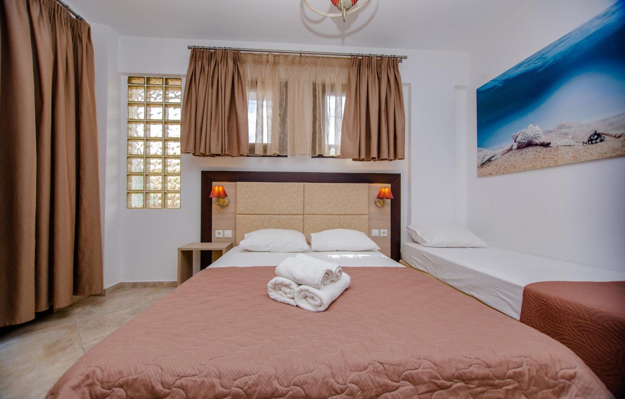 Sea Pearl Luxury Apartments Nea Vrasna Bagian luar foto