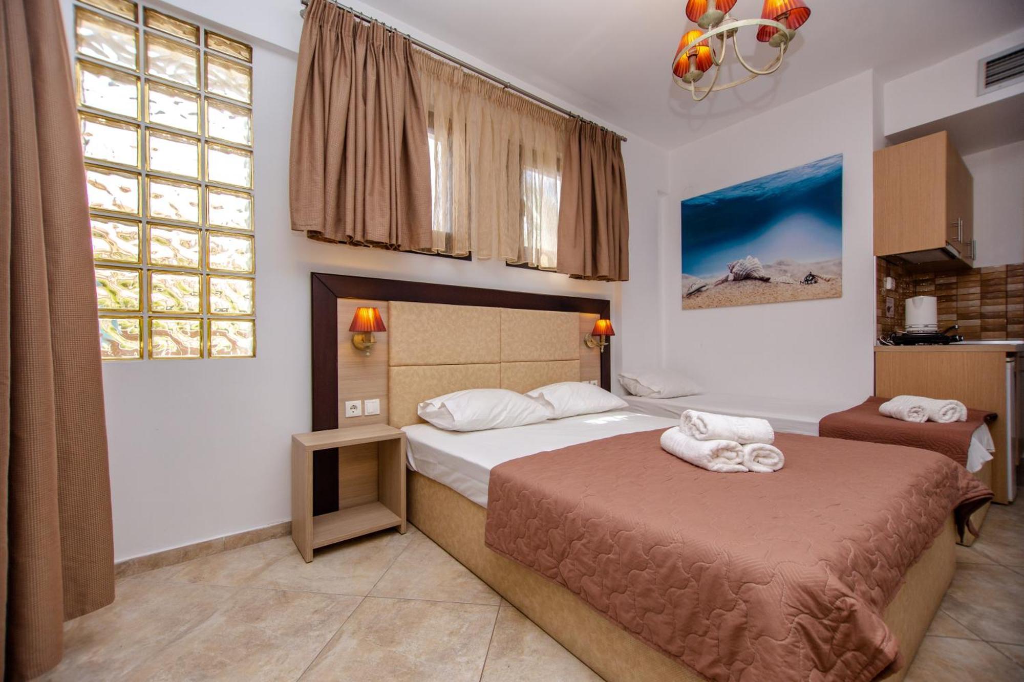 Sea Pearl Luxury Apartments Nea Vrasna Bagian luar foto