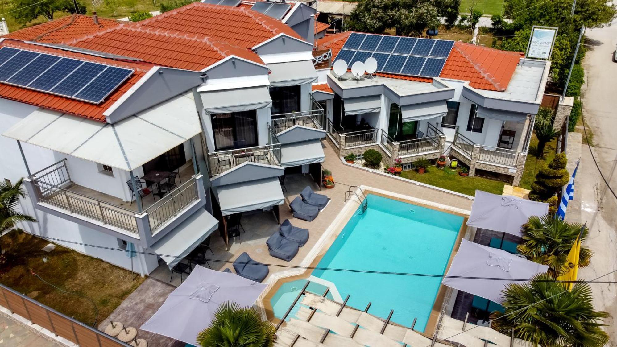 Sea Pearl Luxury Apartments Nea Vrasna Bagian luar foto
