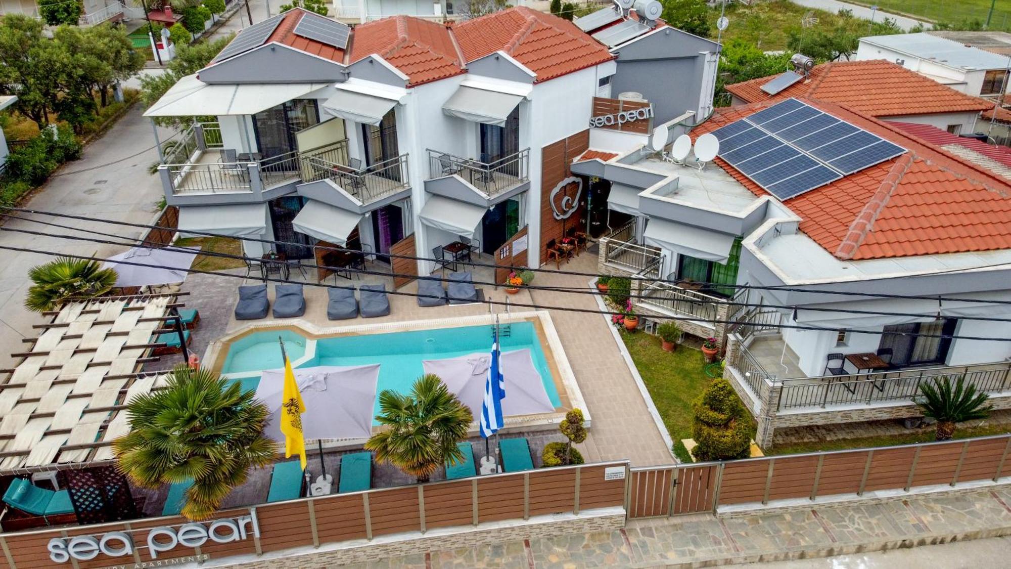 Sea Pearl Luxury Apartments Nea Vrasna Bagian luar foto