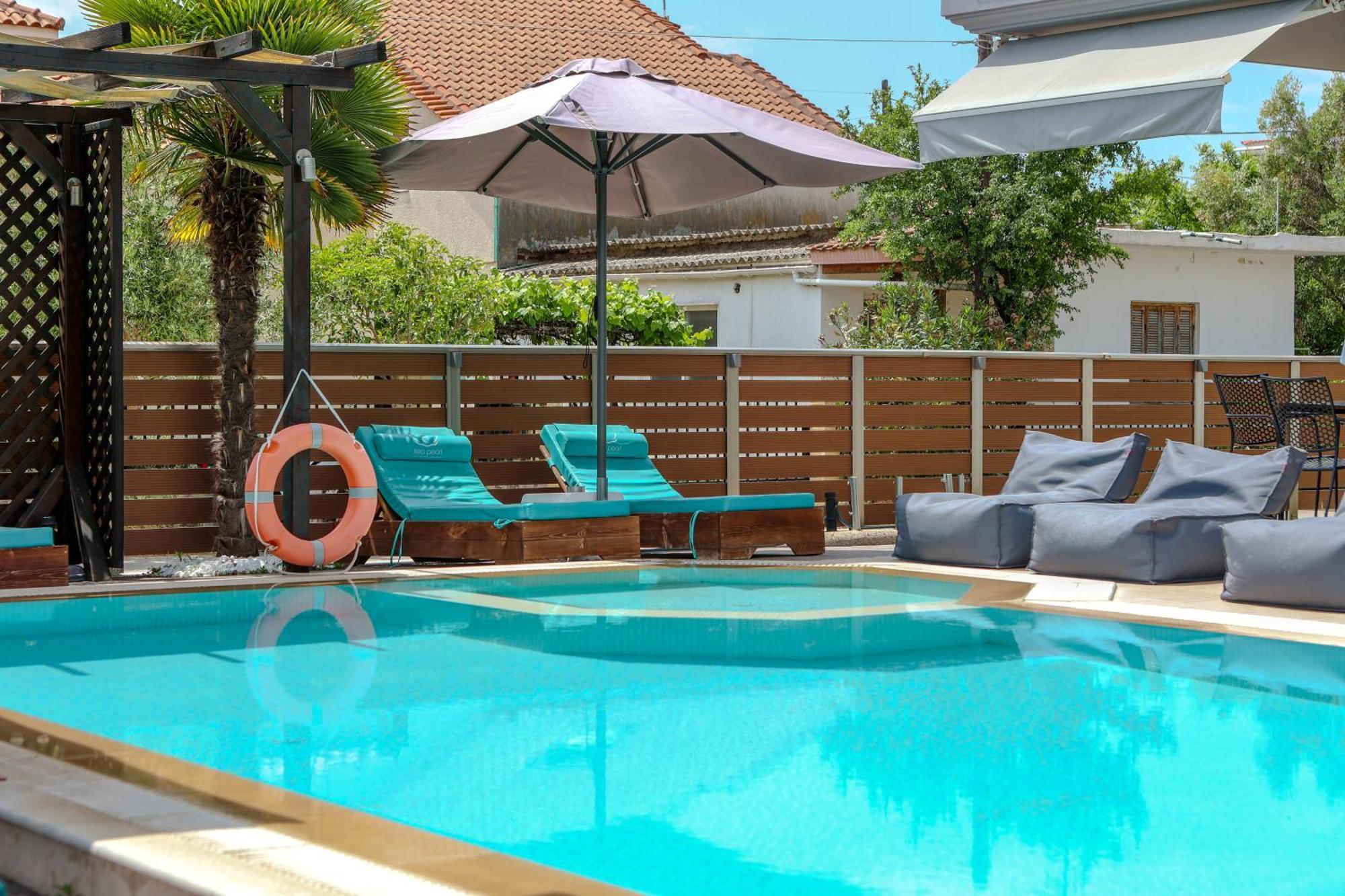 Sea Pearl Luxury Apartments Nea Vrasna Bagian luar foto